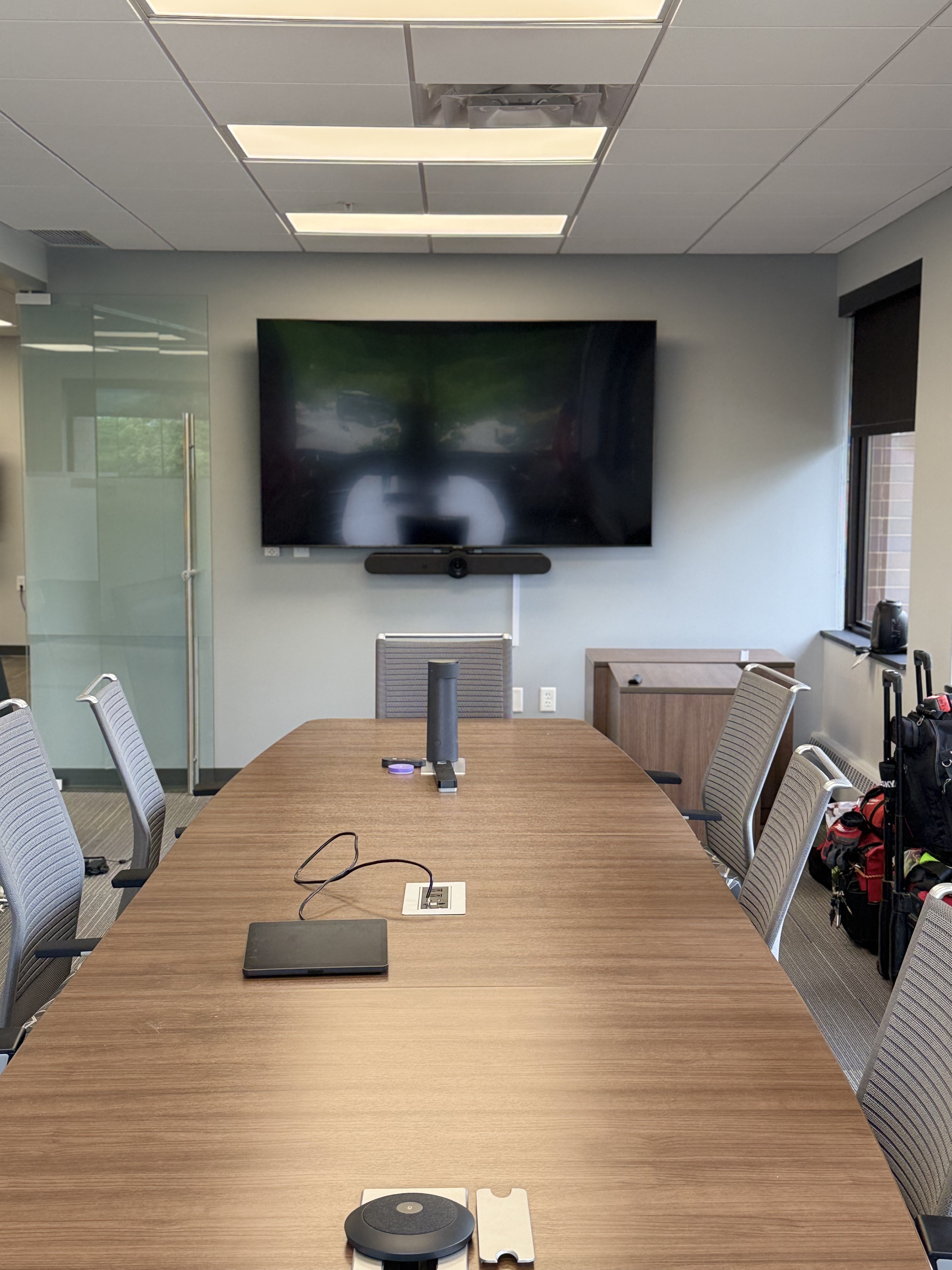 85' tv installation with neat pad , neat center &  logi bar and table microphones — from Christopher O.'s work portfolio in Brooklyn